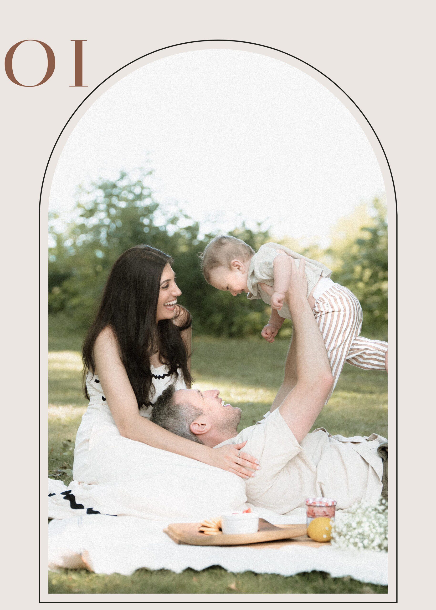 Family photography session in Erie PA featuring parents playing with baby during an outdoor park photoshoot.