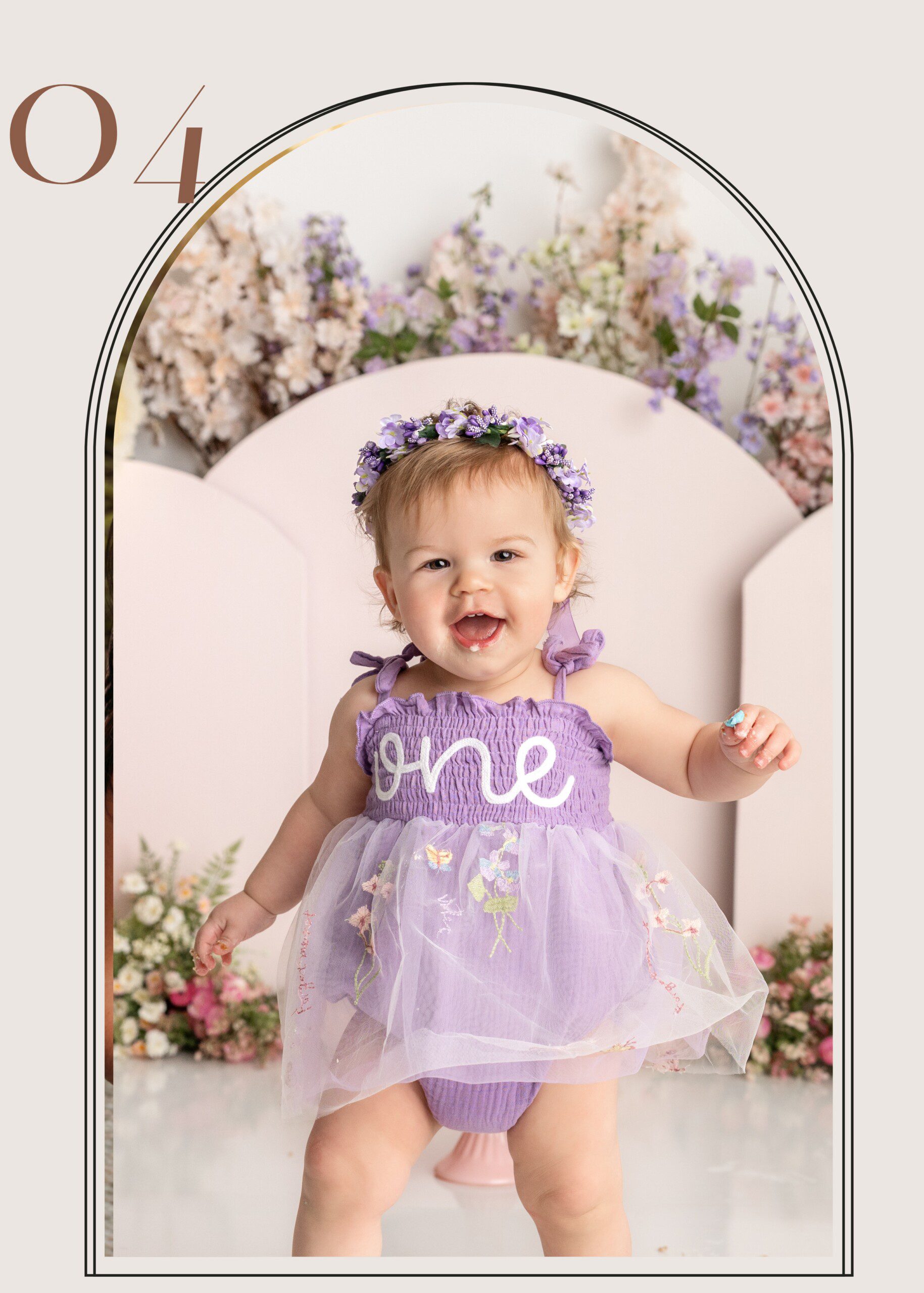 One-year-old baby girl wearing a lavender dress during a cake smash session at Maria Angeles Photography studio in Erie, Pennsylvania